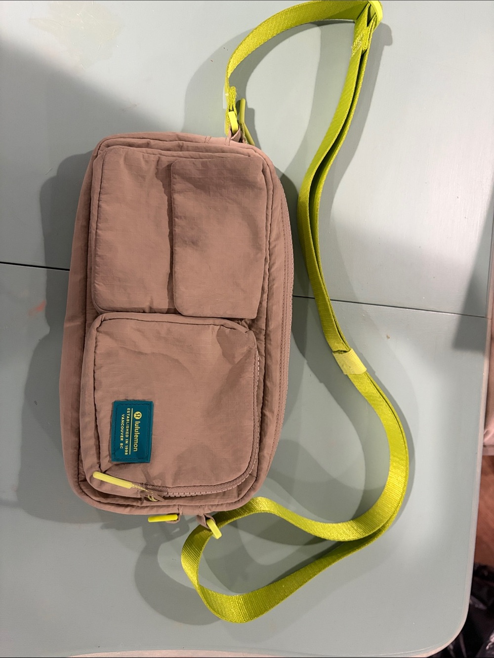 Mini Crossbody Bag in sheer oak with Neon sour grape Strap